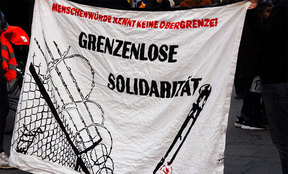 Banner Grenzenlose Solidarität 2023 (c) Anna Blank